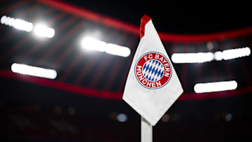 A corner flag bearing the logo of FC Bayern Munchen is seen...