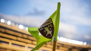 A corner flag bearing the logo of Torino FC waves during... A corner flag bearing the logo of Torino FC waves during...