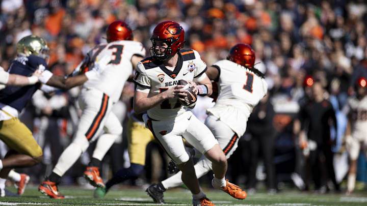 Dec 29, 2023; El Paso, TX, USA; Oregon State Beavers quarterback Ben Gulbranson (17) drops back to throw the ball against the Notre Dame defense in the first half at Sun Bowl Stadium. Mandatory Credit: Ivan Pierre Aguirre-USA TODAY Sports