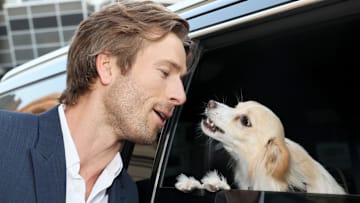 Glen Powell (left) and Brisket in 2024.