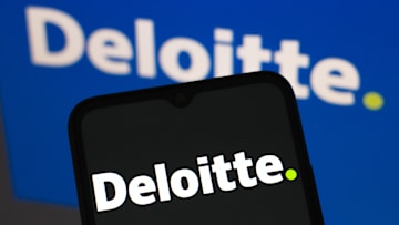 In this photo illustration, the Deloitte Touche Tohmatsu...