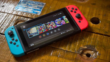 A turned on Nintendo Switch with 2 Joy-Con attached on it.