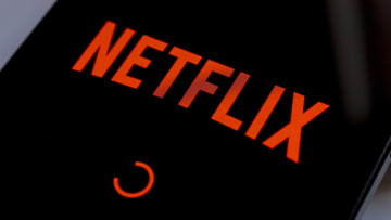 In this photo illustration, the Netflix streaming app logo...