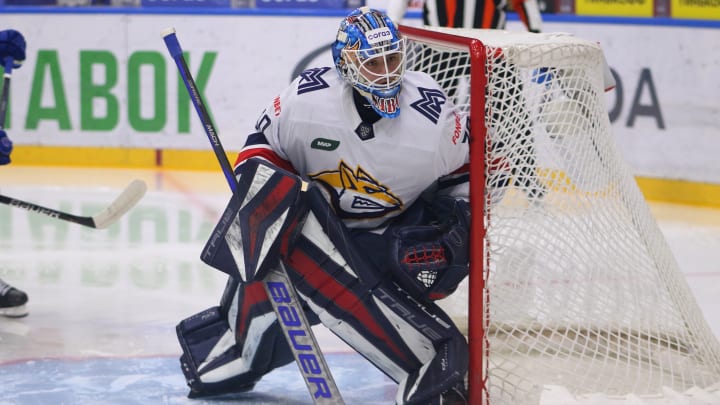 Metallurg Hockey Club player, Ilya Nabokov (30) seen in...