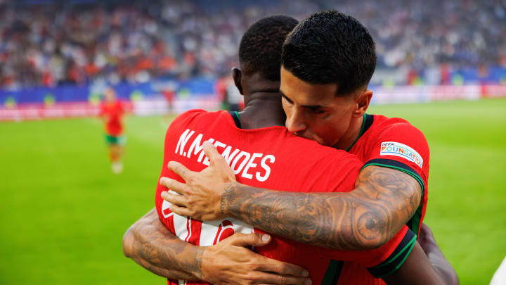 (L-R) Nuno Mendes and Joao Cancelo (Portugal) seen during...