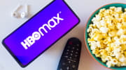 In this photo illustration, the HBO Max logo seen displayed...