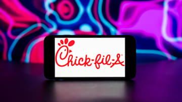 In this photo illustration, the Chick-fil-A logo is seen...