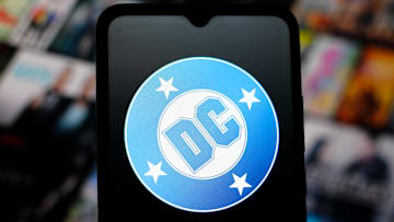 In this photo illustration, the DC Comics logo is seen...