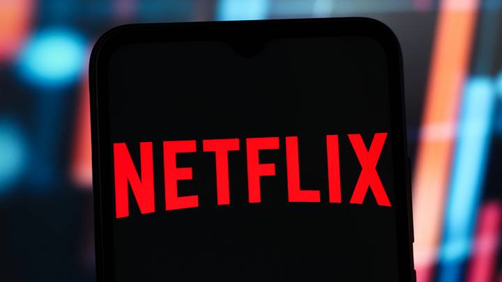 In this photo illustration, the Netflix logo is seen...