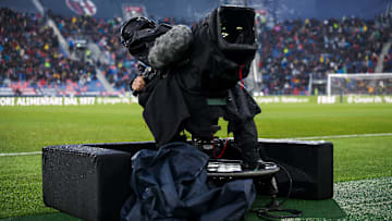 A cameraman works with a TV camera prior to the Serie A