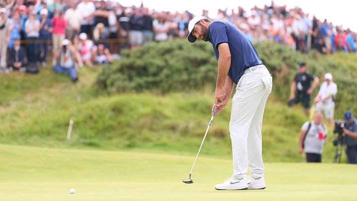 Scottie Scheffler putts during the final round of the 2025 Open Championship at Royal Portrush