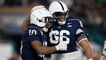Penn State football running back Nicholas Singleton and offensive tackle Drew Shelton at the Capital One Orange Bowl