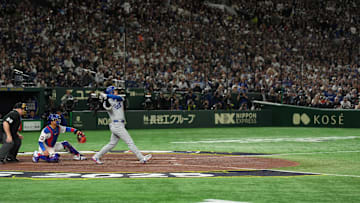 Los Angeles Dodgers designated hitter Shohei Ohtani hits a home run against the Chicago Cubs in the Tokyo Series. 