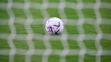 An official Serie A ball, Puma Orbita, is seen through the...