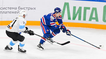 Ivan Demidov (91) of SKA and Chris Tierney (71) of Dinamo...