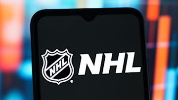 In this photo illustration, the NHL (National Hockey League...