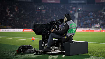 A cameraman works with a TV camera prior to the Serie A A cameraman works with a TV camera prior to the Serie A