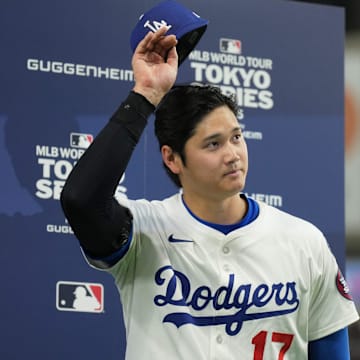 Mar 19, 2025; Bunkyo, Tokyo, JPN; Los Angeles Dodgers designated hitter Shohei Ohtani (17) tips his hat to fans after defeating the Chicago Cubs during the Tokyo Series at Tokyo Dome. Mandatory Credit: Darren Yamashita-Imagn Images