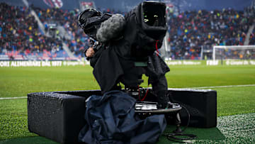 A cameraman works with a TV camera prior to the Serie A