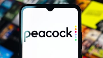 In this photo illustration, the Peacock logo is seen...