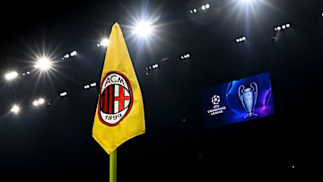 An AC Milan branded corner flag is seen as a scoreboard on...
