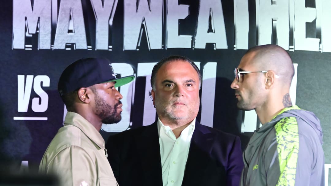 Boxers Floyd Mayweather Jr  and John Gotti III  poses for...