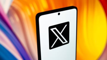 In this photo illustration, the X (Twitter) logo is...