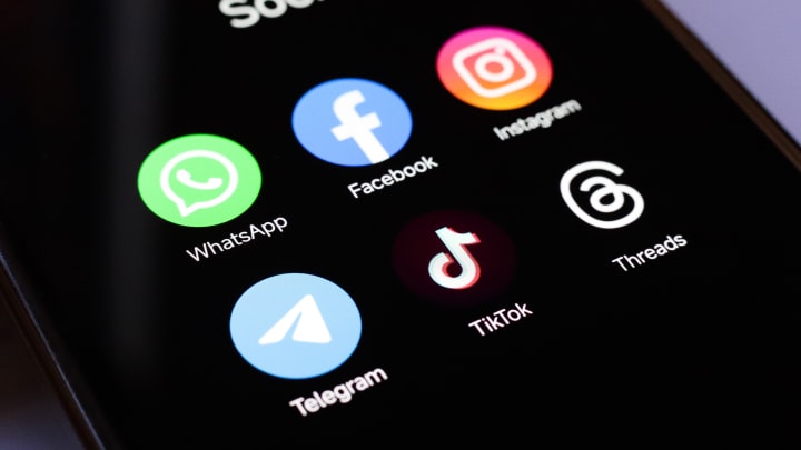 In this photo illustration, WhatsApp, Facebook, Instagram,...