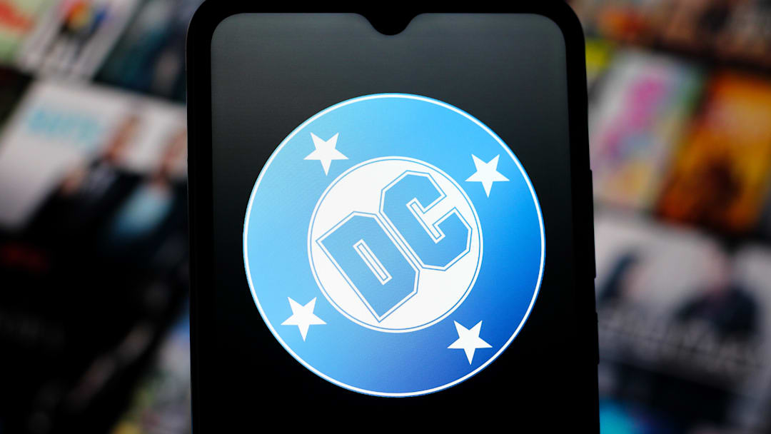 In this photo illustration, the DC Comics logo is seen...