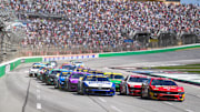 Sep 8, 2024; Hampton, Georgia, USA; NASCAR Cup Series driver Michael McDowell (34) leads the pack to begin the race at Atlanta Motor Speedway. Mandatory Credit: Jason Allen-Imagn Images