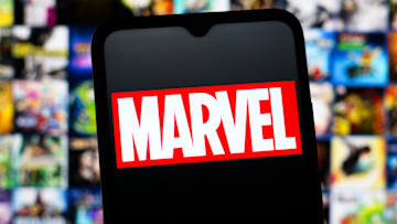 In this photo illustration, the Marvel logo is seen...