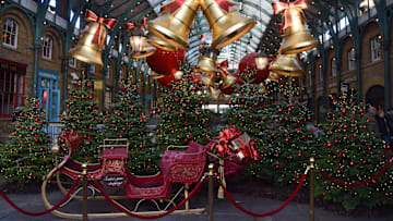 Christmas decorations, trees and Santa's sleigh at Covent...