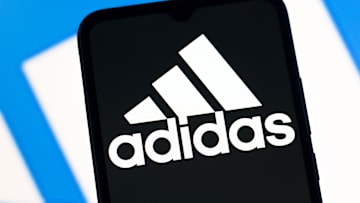 In this photo illustration, the Adidas logo is seen...