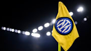 A corner flag bearing the logo of FC Internazionale is seen...