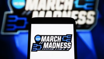 In this photo illustration, a March Madness (NCAA Division I...