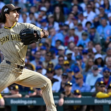 Oct 1, 2025; Chicago, Illinois, USA; San Diego Padres starting pitcher Dylan Cease (84) delivers a pitch against the Chicago Cubs in the first inning during game two of the Wildcard round for the 2025 MLB playoffs at Wrigley Field. Mandatory Credit: Matt Marton-Imagn Images
