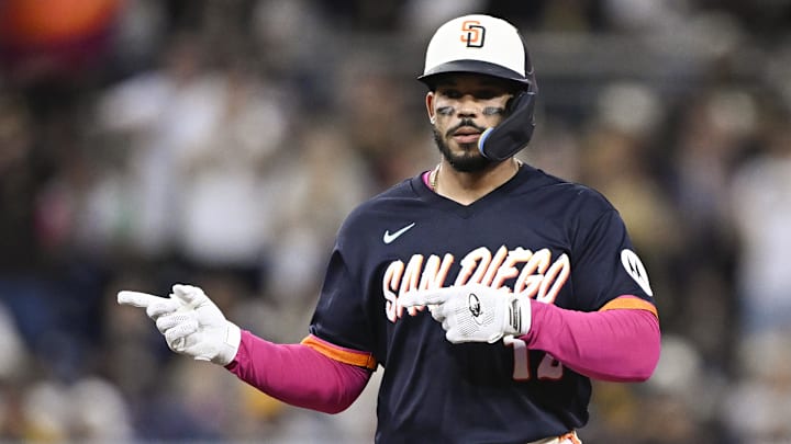Apr 10, 2026; San Diego, California, USA; San Diego Padres catcher Luis Campusano (12) gestures after hitting a double during the third inning against the Colorado Rockies at Petco Park. Mandatory Credit: Denis Poroy-Imagn Images