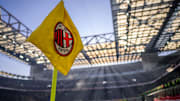 A corner flag bearing the logo of AC Milan is seen during...