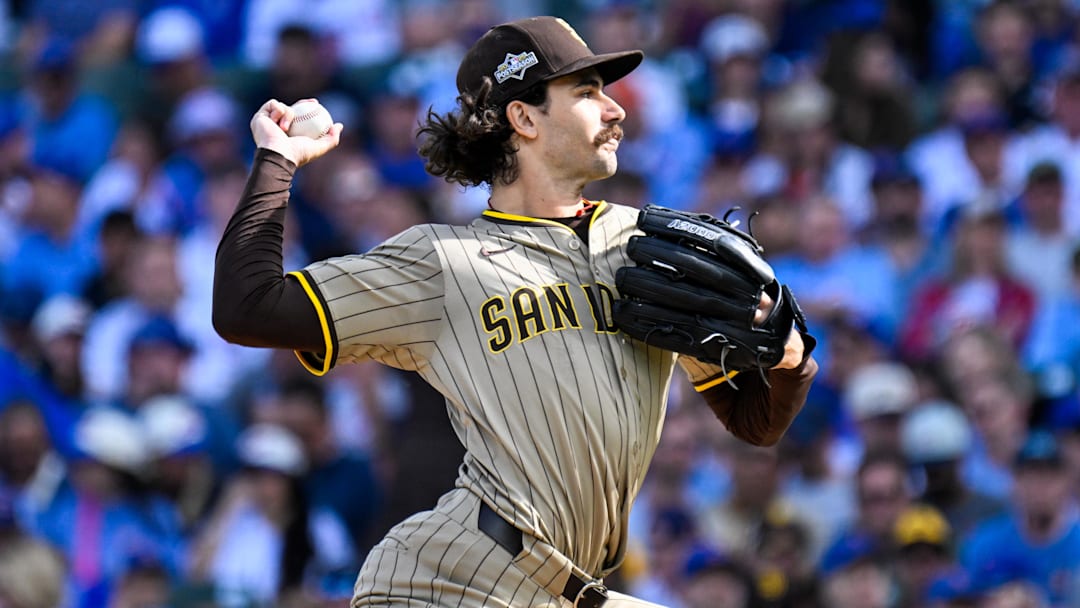 Former San Diego Padres starting pitcher Dylan Cease delivers a pitch against the Chicago Cubs in the first inning during game two of the Wildcard round for the 2025 MLB playoffs at Wrigley Field.