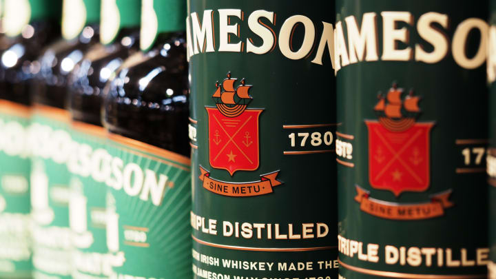 Bottles of Jameson Irish Whiskey seen displayed on shelves...