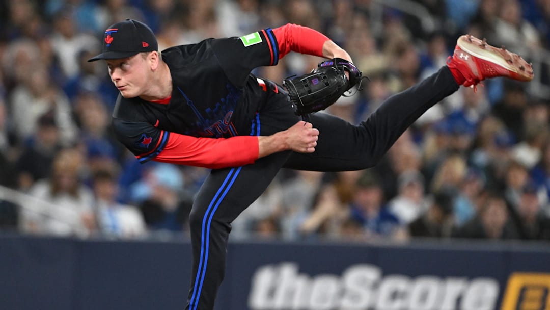 Apr 10, 2026; Toronto, Ontario, CAN;   Toronto Blue Jays relief pitcher Louis Varland (77) delivers a pitch against the Minnesota Twins in the sixth inning at Rogers Centre. Mandatory Credit: Dan Hamilton-Imagn Images