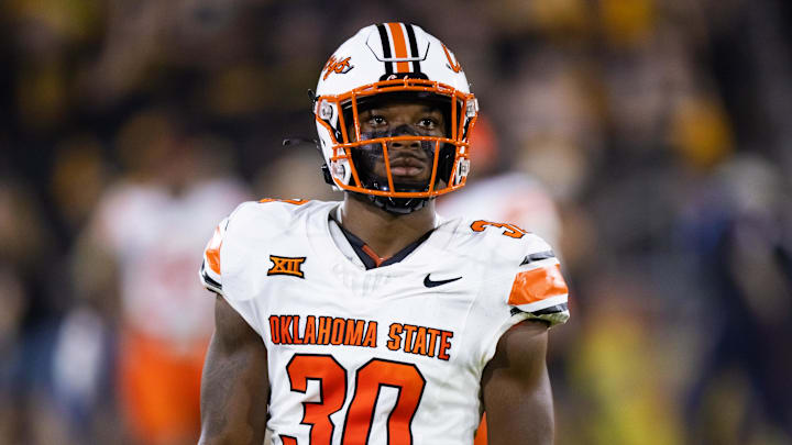 Sep 9, 2023; Tempe, Arizona, USA; Oklahoma State Cowboys linebacker Collin Oliver (30) against the Arizona State Sun Devils at Mountain America Stadium. Mandatory Credit: Mark J. Rebilas-Imagn Images