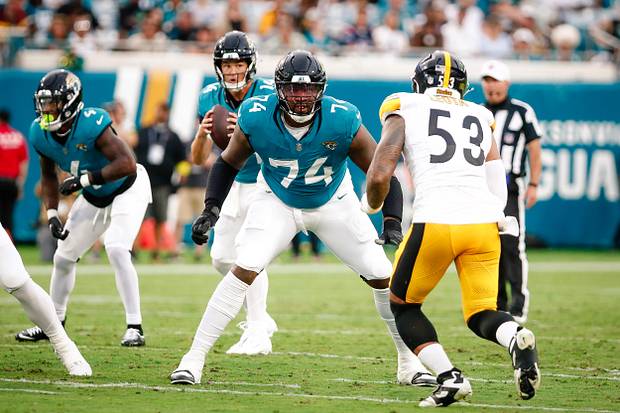 Jacksonville Jaguars offensive tackle Fred Johnson prepares to block a rusher against the Pittsburgh Steelers.