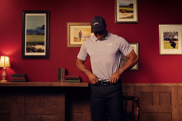 Tiger Woods models Sun Day Red apparel.