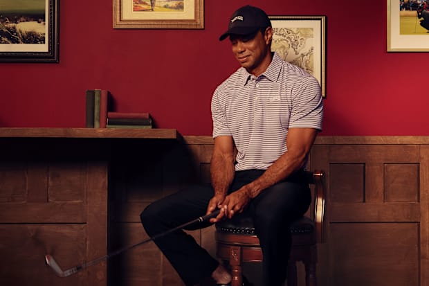 Tiger Woods models Sun Day Red apparel.