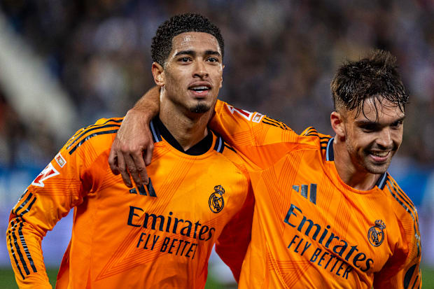 Real Madrid's Raul Asencio with Jude Bellingham