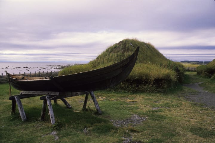 Replicas of a Viking structure and boat at L’Anse aux Meadows.