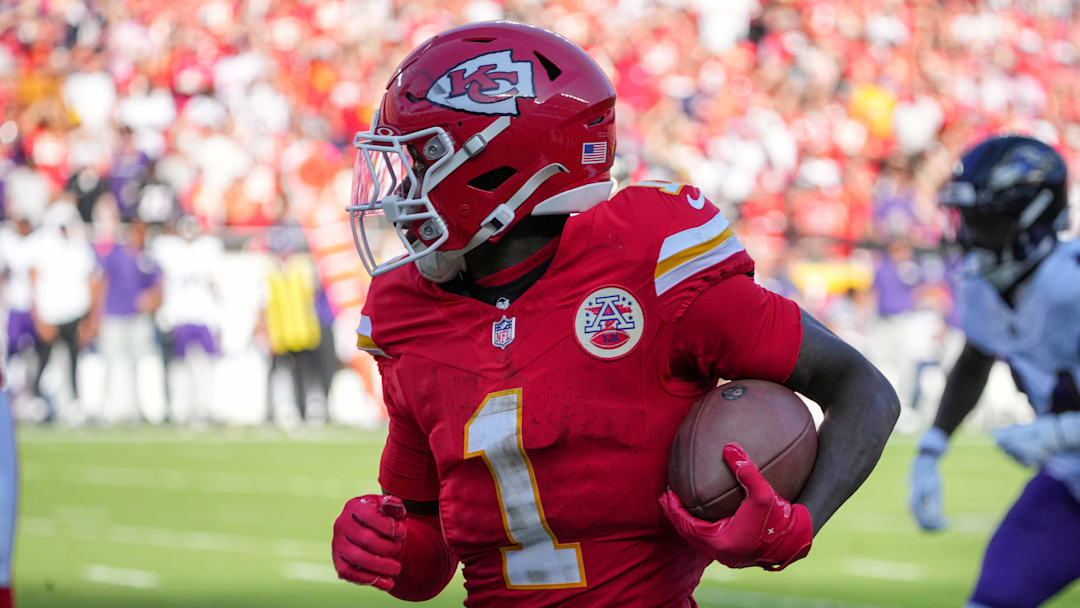 Sep 28, 2025; Kansas City, Missouri, USA; Kansas City Chiefs wide receiver Xavier Worthy (1) runs the ball against the Baltimore Ravens during the game at GEHA Field at Arrowhead Stadium. Mandatory Credit: Denny Medley-Imagn Images