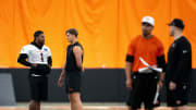 Cincinnati Bengals wide receiver Ja'Marr Chase (1) and Cincinnati Bengals quarterback Joe Burrow (9) talk at Bengals spring practice at the IEL Indoor Facility in Cincinnati on Thursday, June 13, 2024.