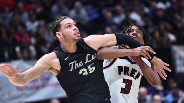 Harvest Prep guard London Foggie (3) battles Lutheran East center Jesse McCulloch (35) for a rebound during the Division III state championship game Sunday, March 24, 2024.